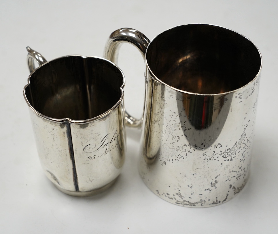 A George V silver mug, by Walker & Hall, Sheffield, 1936, 88mm, together with an earlier silver christening mug, 10.1oz. Condition - fair